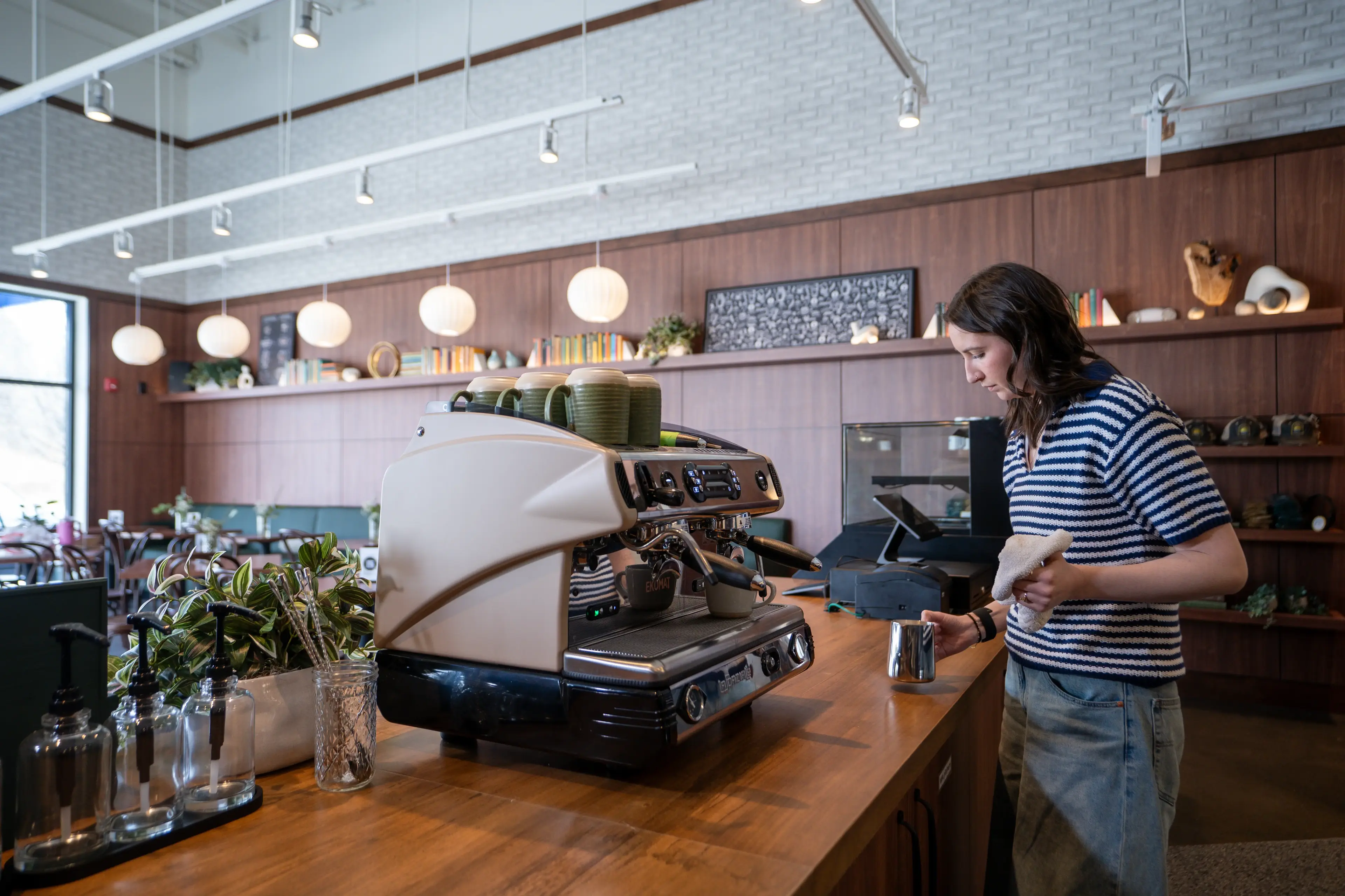 Cafe interior with barista